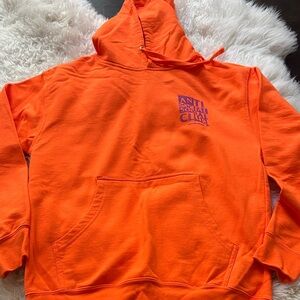 BNWT Anti Social Social Club  vibrant orange hoodie with purple writing